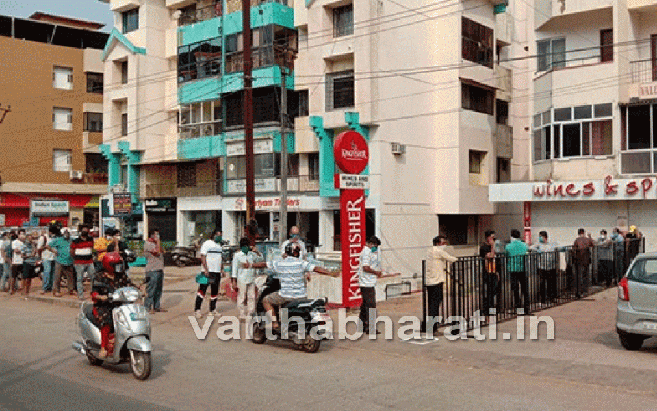 Spirited booze lovers throng stores as liquor sales resume in Karnataka