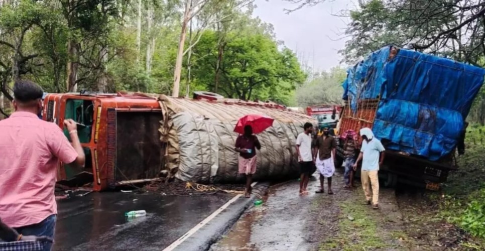 Chamarajanagar: Rice-laden truck overturns on highway; Driver injured