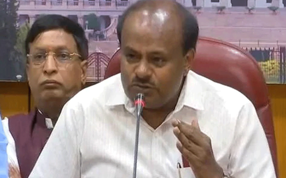 Govt will complete full term, says Kumaraswamy after son speaks of polls