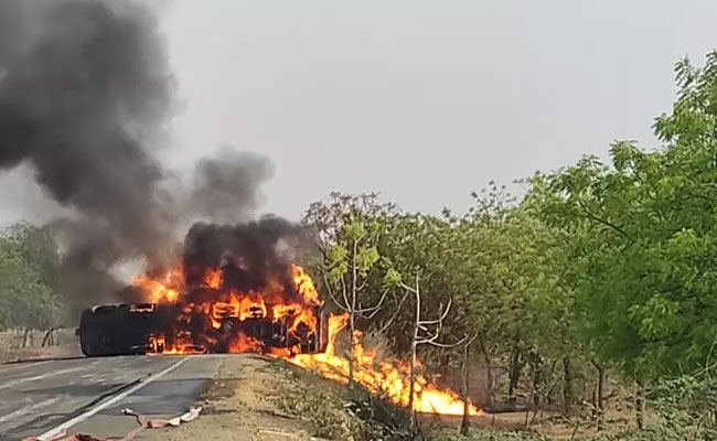 Spirit tanker topples beside road, catches fire in Vijayapura