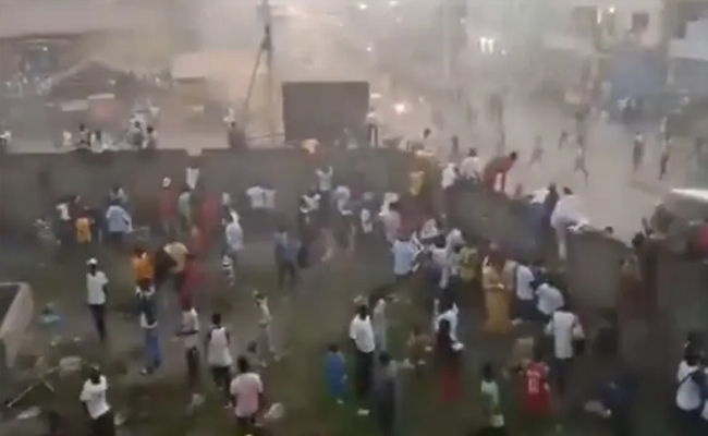 Dozens, including children, killed in stampede following clashes at Guinea soccer match