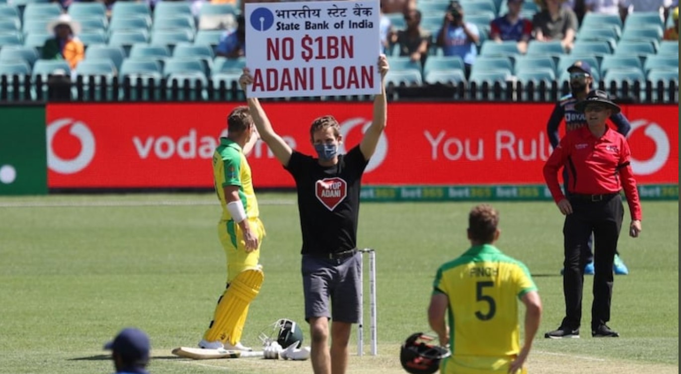 Anti-Adani protesters invade ground during India-Australia match, posters read ‘No $1BN Adani Loan’