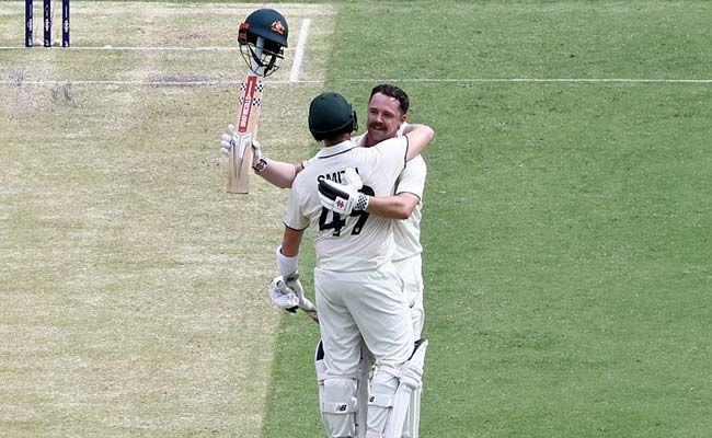 Head, Smith tons deflate India as Australia reach 405 for 7 on Day 2