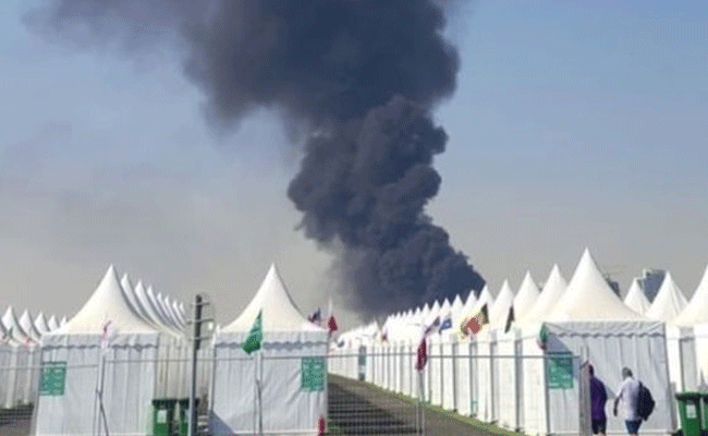 Fire sends smoke over Doha skyline during World Cup in Qatar