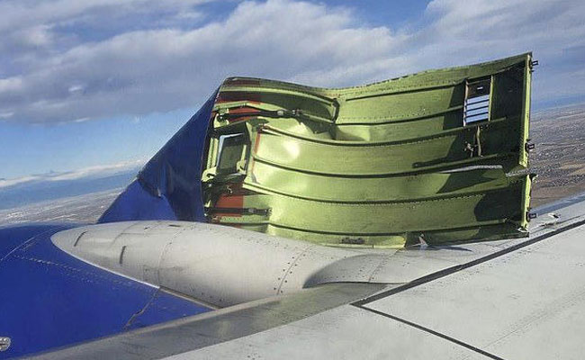 An engine cover on a Southwest Airlines plane rips off, forcing the flight to return to Denver