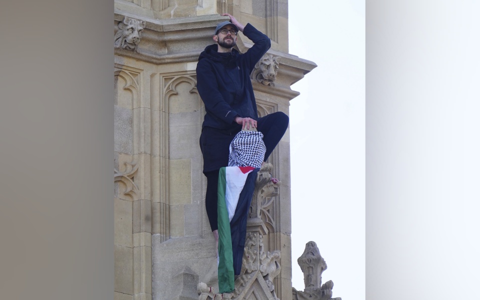 Man with Palestinian flag climbs London's Big Ben, is surrounded by emergency services