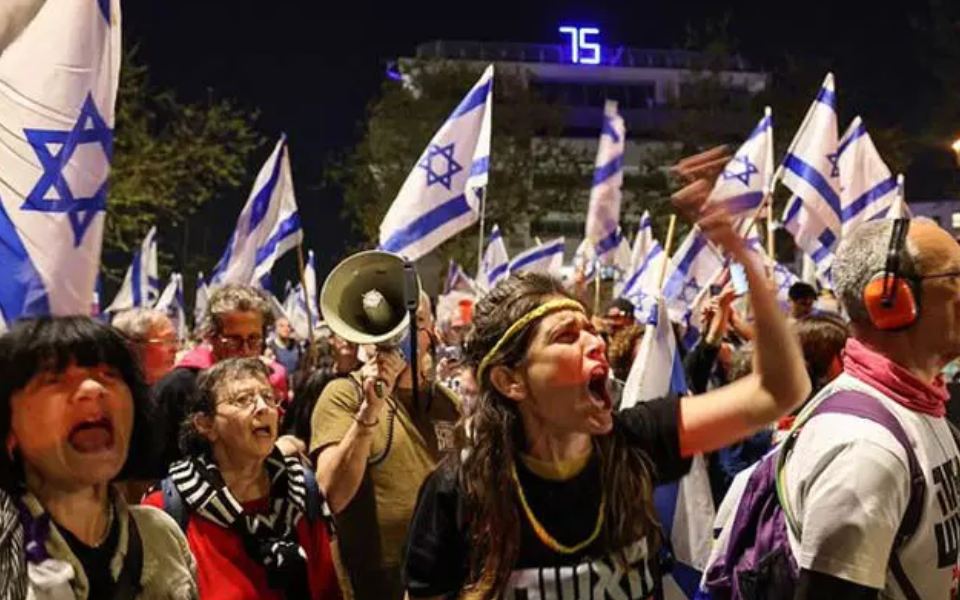 Israelis rally in their largest anti-government protest since the war in Gaza began