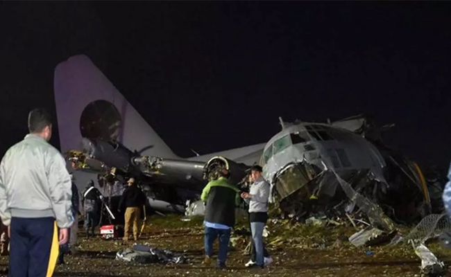 Cargo plane carrying money crashes near Bolivia's capital, killing at least 15 people, official says
