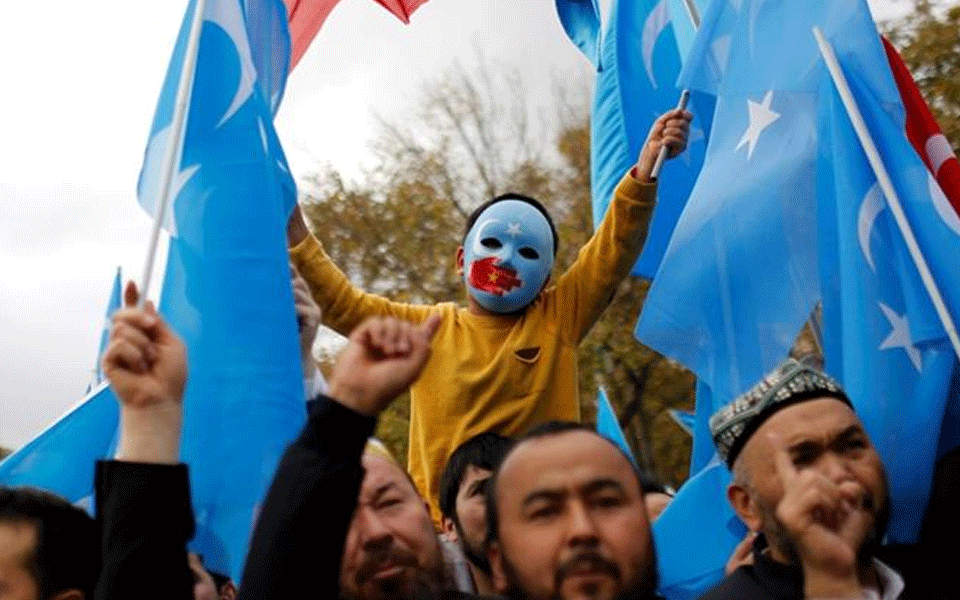 US restricts visas to China officials over Uighur 'repression'
