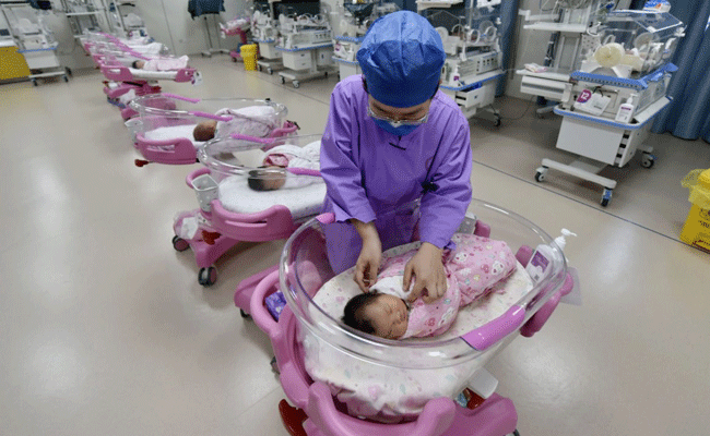 China records 1st recent population decline as births plunge