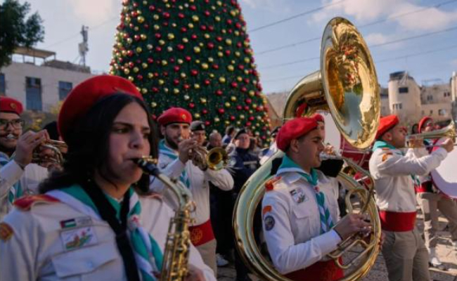 Christmas returns to Bethlehem after two-year pause, with ‘half joy, half sadness’