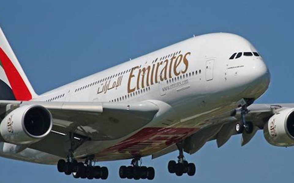 About 100 people fall ill on Emirates flight to New York - CDC