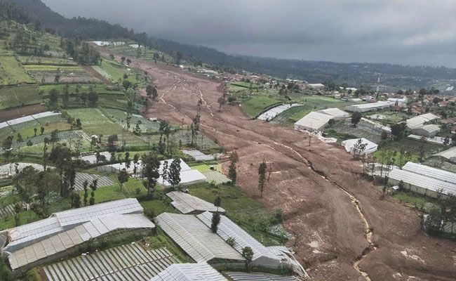 Indonesian rescuers struggle with mud, debris in search for dozens missing after deadly landslide