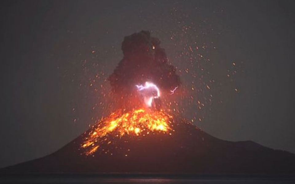 Indonesia asks people to avoid coast near erupting volcano