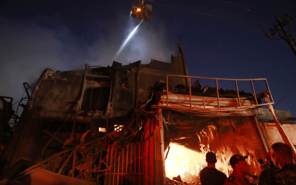 Fire, building collapse injures 28 people in Iraq's capital