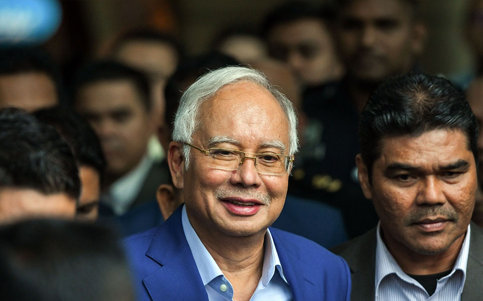 Former Malaysian PM charged with money laundering