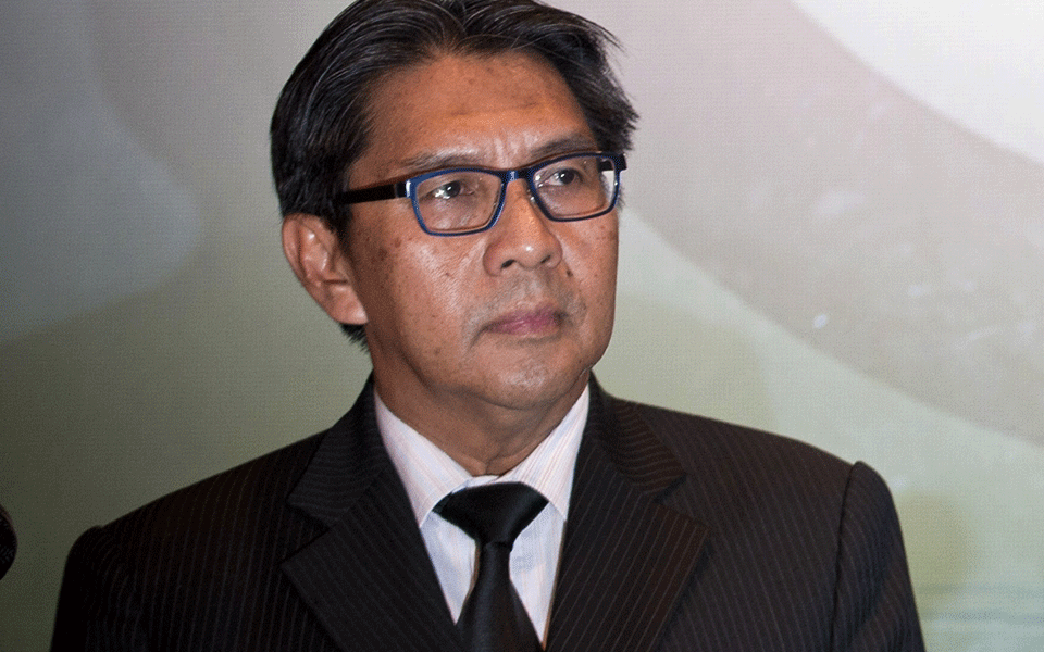 Malaysia's civil aviation chief resigns following MH370 report