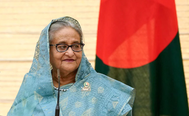 Sheikh Hasina to return to Bangladesh when caretaker government announces elections, says son