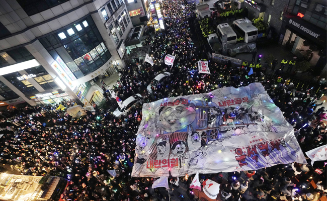 South Korean investigators push to summon impeached president as court set to determine his fate