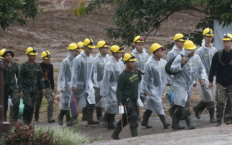 All 12 boys, football coach rescued from flooded Thailand cave