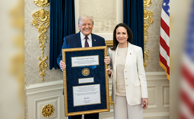 Venezuelan Nobel Peace Prize winner presents her medal to Trump
