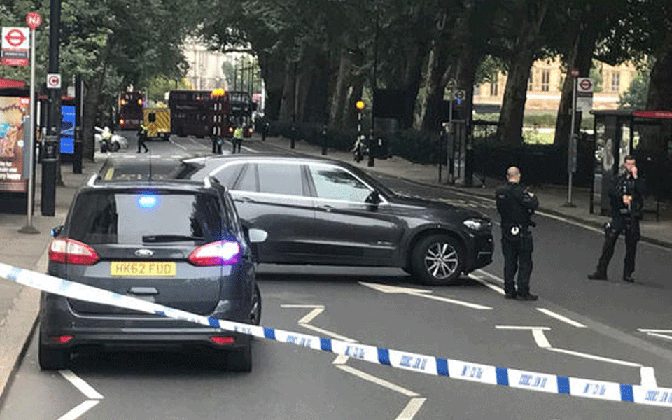 Car crashes into people near UK Parliament, man arrested